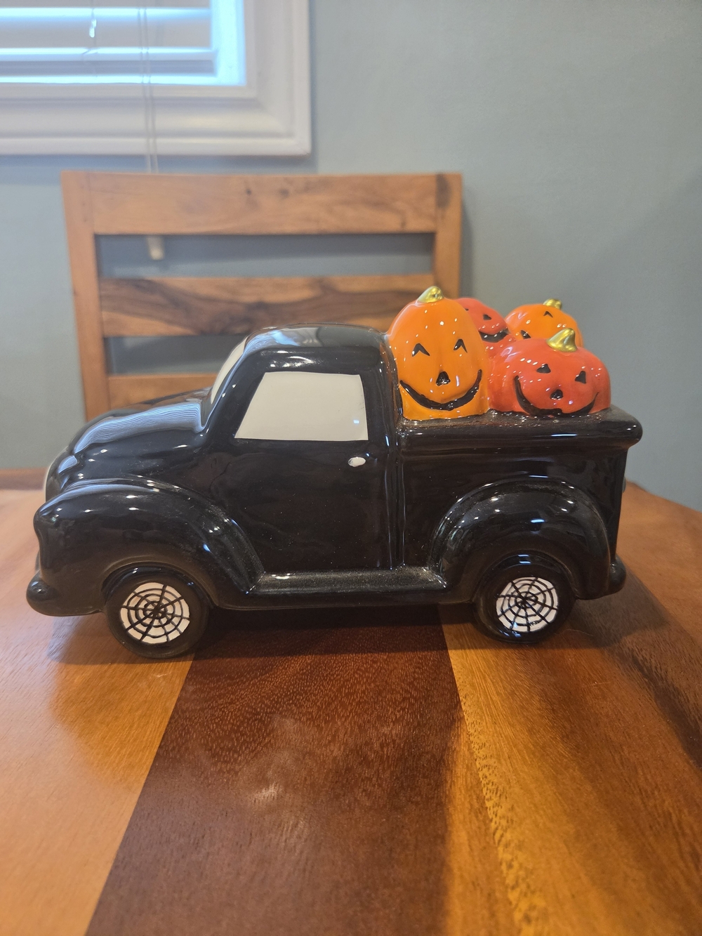Black Ceramic Pickup Truck with Orange Jack-O'-Lanterns